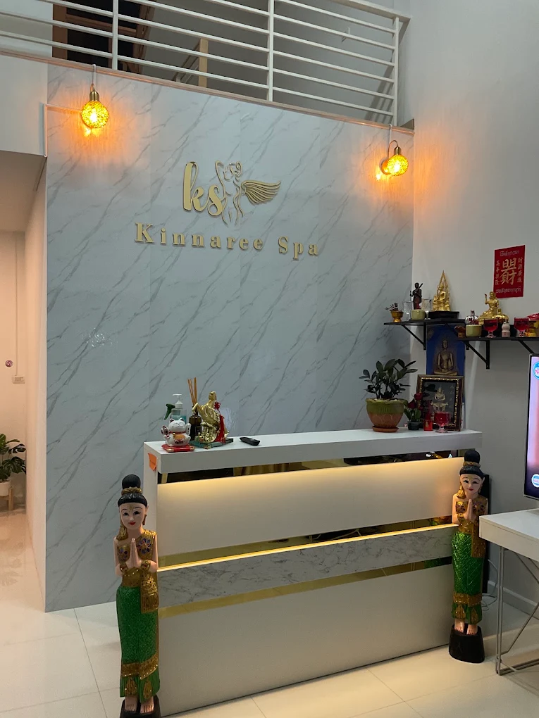 Kinnaree Spa reception with elegant marble feature wall