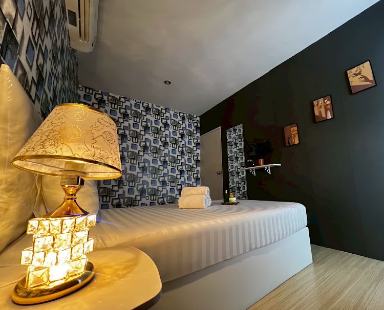 Close view of a warmly lit massage room at Kinnaree Spa